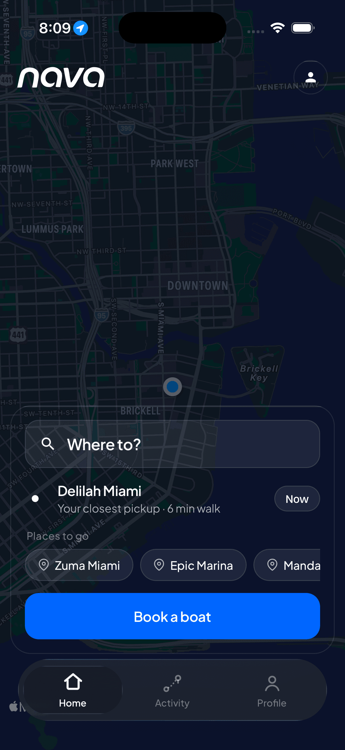 The Nava app home: the dark map of Biscayne Bay with the booking panel asking where to